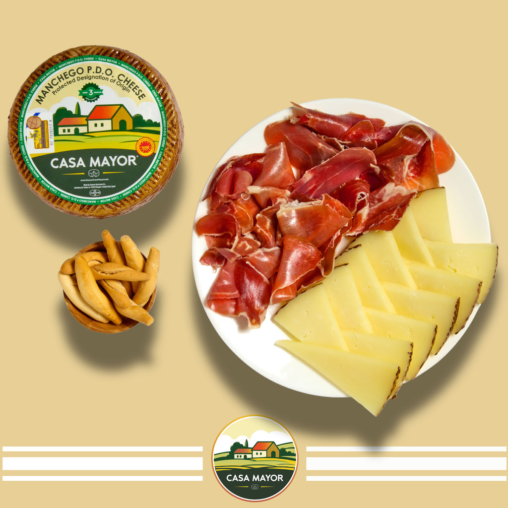 Manchego Cheese D.O.P – Approx. 1 lb Wheel + Serrano Ham (2 oz by Fermín) + Free Breadsticks (Picos) – Spanish Tapas Gift Set – Authentic Product of Spain by Casa Mayor